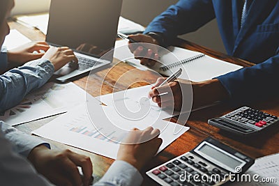 teamwork business working on desk accounting concept financial in office Stock Photo