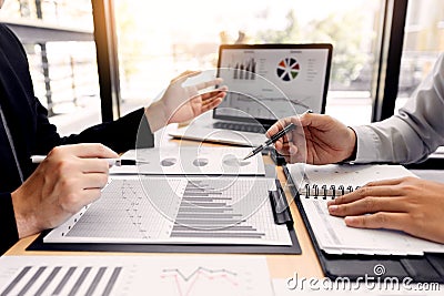 Teamwork company meeting concept, business partners working with laptop computer together analysing startup financial project Stock Photo