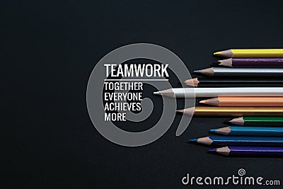 Teamwork concept. group of color pencil on black background with word Teamwork, Together, Everyone, Achieves and More Stock Photo