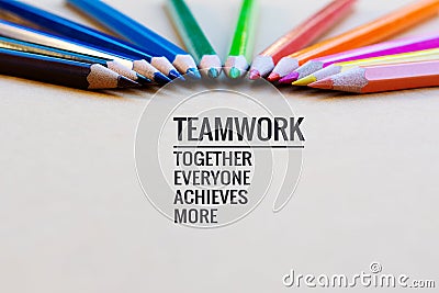 Teamwork concept. group of color pencil on brown background with word Teamwork, Together, Everyone, Achieves and More Stock Photo