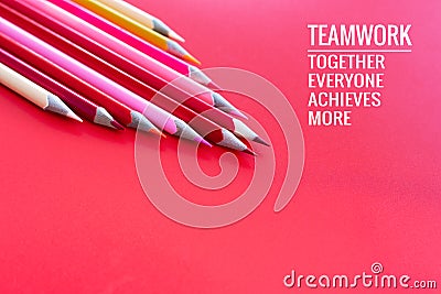 Teamwork concept. group of color pencil on pink background with word Teamwork, Together, Everyone, Achieves and More Stock Photo