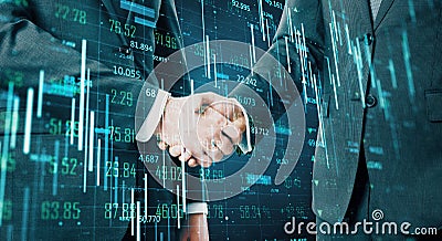 Teamwork concept with handshaking businessmen Stock Photo