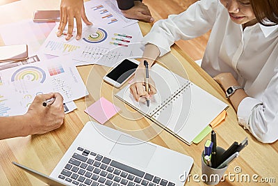 Teamwork helps us select the best information. To bring to customers to use in successful work. Quality work concept, vintage Stock Photo