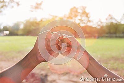 Teamwork of human hands make bump Stock Photo