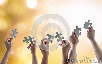 Teamwork idea brainstorming, team partnership connection for problem solving, finding solution in hope concept with puzzle pieces Stock Photo