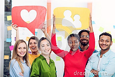 Teamwork in office happy to receive friends, follower and like from social network Stock Photo