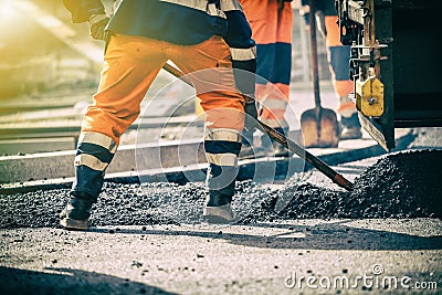 Teamwork on road construction Stock Photo