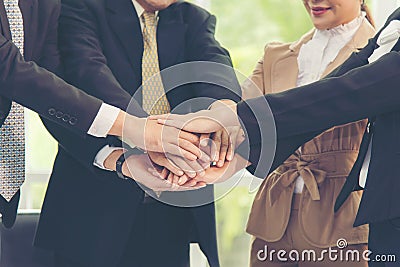 Teamwork Success. Close up hands executive business people group team happy showing teamwork Stock Photo