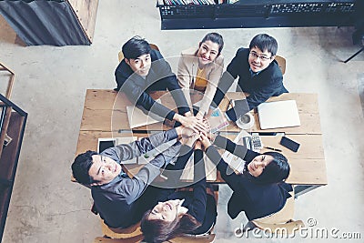 Teamwork Success. Top view executive business people group team happy showing teamwork Stock Photo