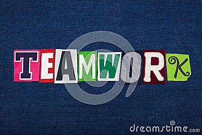 TEAMWORK text word collage, multi colored fabric on blue denim, team effort concept Stock Photo