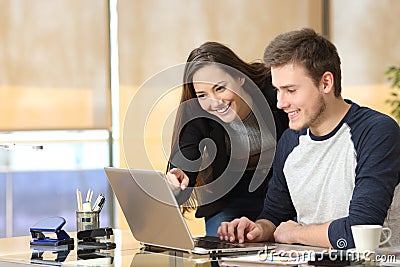 Teamwork working online at office Stock Photo