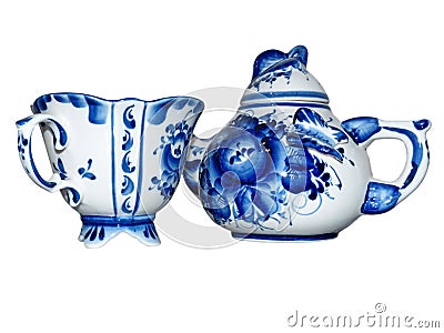 Teapot and Cup. Home tableware in Russian traditional Gzhel style. Closeup. Gzhel - Russian folk craft of ceramics Stock Photo