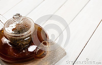 Teapot of fresh tea Stock Photo