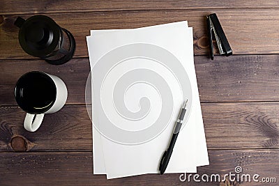 Teapot with tea, a mug, the clean sheet, the handle Stock Photo