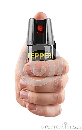 Tear gas or pepper spray in hand Stock Photo