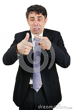 Tearful man pointing to his injured Stock Photo