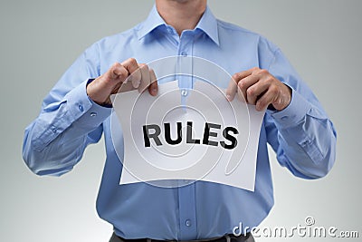 Tearing up the rules Stock Photo