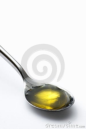Teaspoon of olive oil Stock Photo