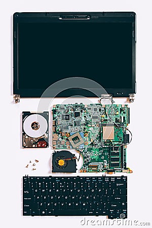 Tech support disassembled laptop electronic parts Editorial Stock Photo