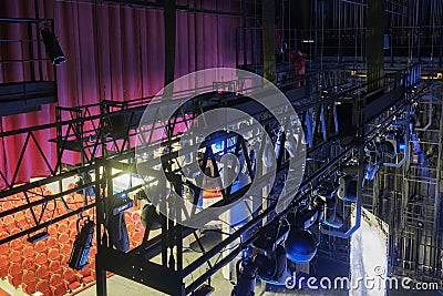 Technical equipment at the backstage of theater. Stage spot lighting rigging structure for a musical theater events Stock Photo