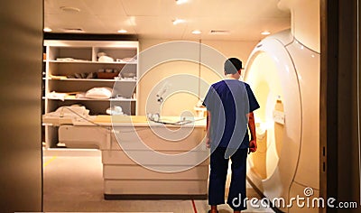 The technician checking mri scanner before scan patient in hospital daily Editorial Stock Photo