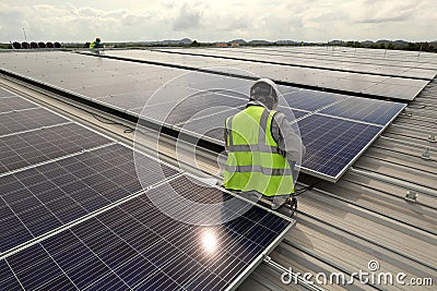 Technician Connecting Cable Solar Rooftop Stock Photo
