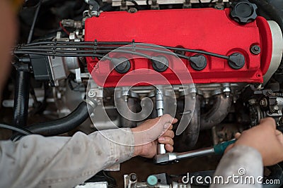 Technician engine checking car service Stock Photo