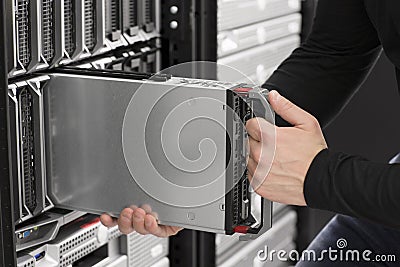 IT Engineer insert a Blade Server in Data Center Stock Photo