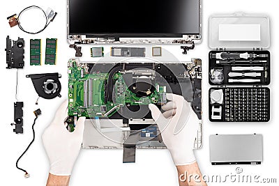 Technician with gloves chainging fix motherboard repair in top view. isolated on white background. computer parts and hand tools Stock Photo