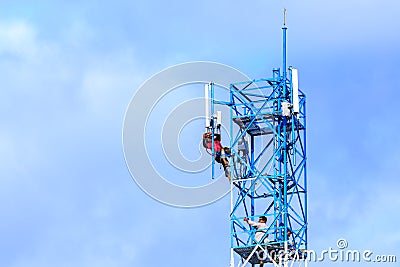 Technician repairing on telecommunication tower Editorial Stock Photo