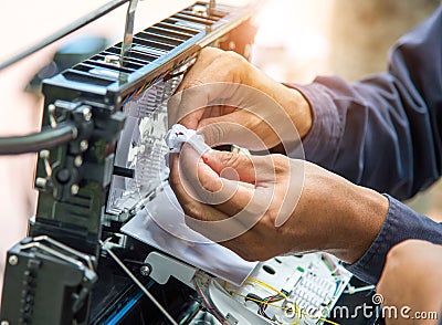 Technicians install cabinet on fiber optic cable. Stock Photo