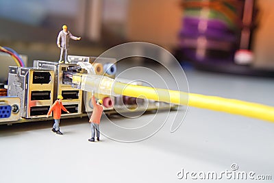 Technicians try to connecting cable wire network connected Stock Photo