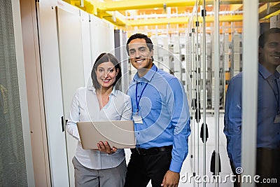 Technicians using laptop Stock Photo