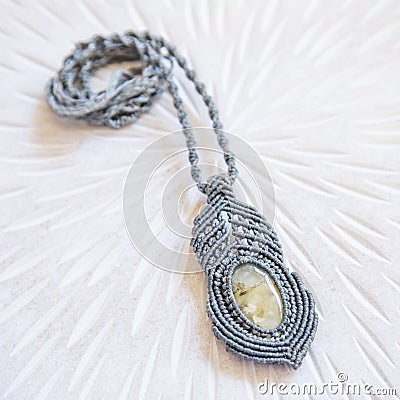 technique waxed string necklace with gemstone Stock Photo