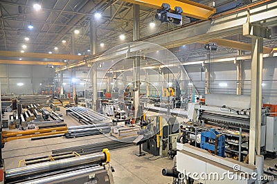 Technological equipment and materials in the workshop for the production of metal structures for industrial and civil construction Editorial Stock Photo