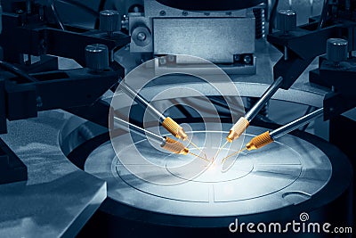 Technological process of soldering and assembly chip, Automated soldering machine inside at industrial, microelectronics manufactu Stock Photo
