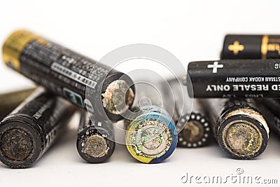 Technology: Close up of corrosion of alkaline batteries. 3 Editorial Stock Photo