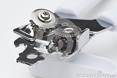 Technology: Close up of a tin can opener, showing an everyday use of gears. 2 Stock Photo