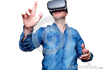 Technology, gaming, entertainment and people concept. Man wearing formal suit and virtual reality headset or 3d glasses, playing Stock Photo