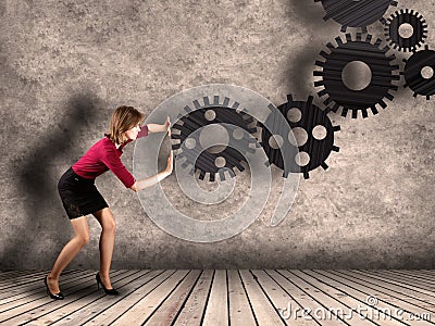 Technology gear concept with businesswoman Stock Photo