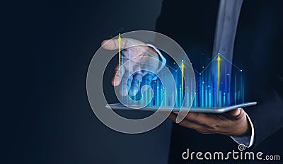 Technology, High Profit, Stock Market, Business Growth, Strategy Planing concept. Businessman in Suit Present Graphs and Charts Stock Photo