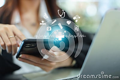 Technology network healthcare concept. Female using smartphone with virtual medical healthcare. Network connection online Stock Photo