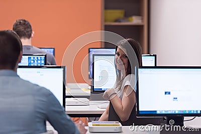 Technology students group working in computer lab school classr Stock Photo