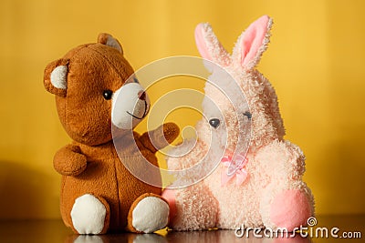 Teddy bear with bunny doll Stock Photo