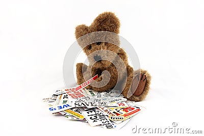 Teddy Bear With Grocery Coupons Stock Photo