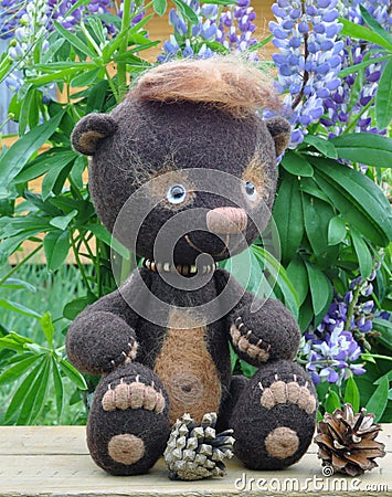 Teddy-bear Mocca on a little boa Stock Photo