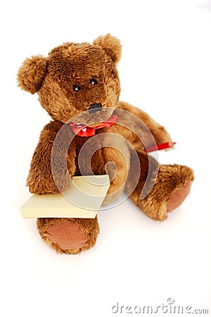 Teddy bear with post it notes and pencil Stock Photo