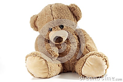 Teddy bear sitting on white background Stock Photo