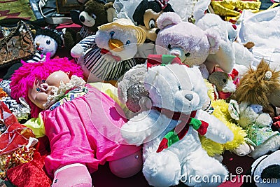 Teddy bears, barbie dolls, toys for kids in a flea market Stock Photo