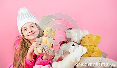 Teddy bears improve psychological wellbeing. Softness is key. Child small girl playful hold teddy bear plush toy. Bears Stock Photo